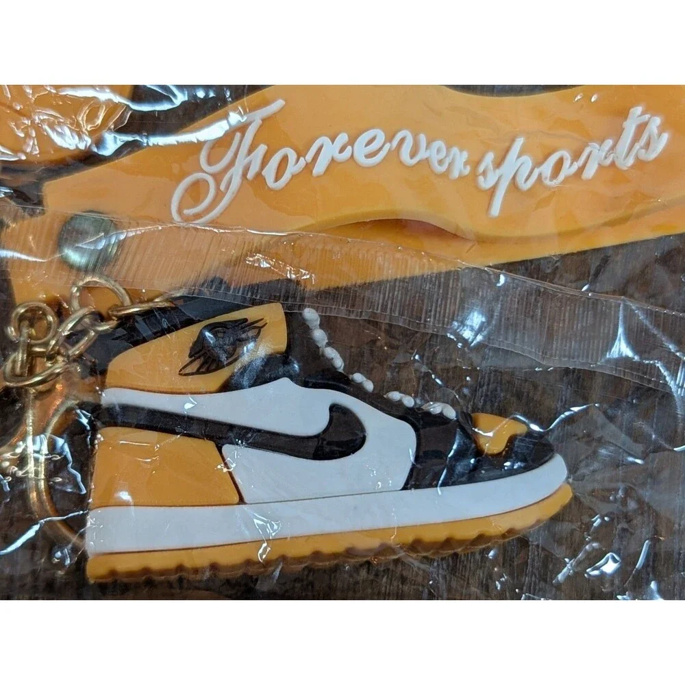 NIP Nike Air Jordan Sneaker Key Chain Yellow Black Forever Sports Basketball